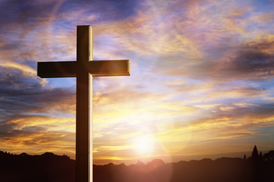 Cross at sunset crucifixion of Jesus Christ 1049887484 727x484